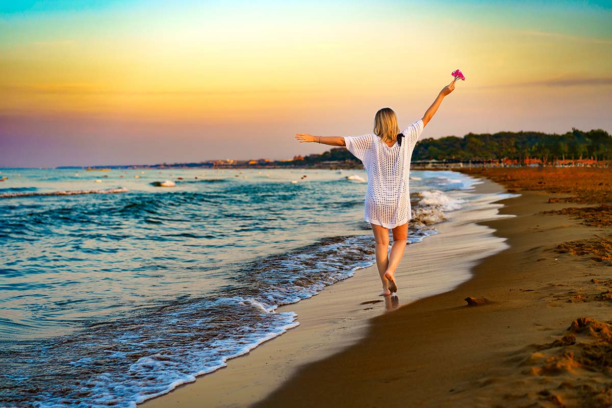 Woman walking on the beach
