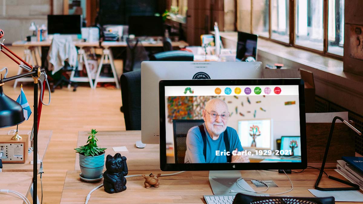 A rendering of the Eric Carle website, featuring. tribute image of Eric Carle who passed away in 2021.
