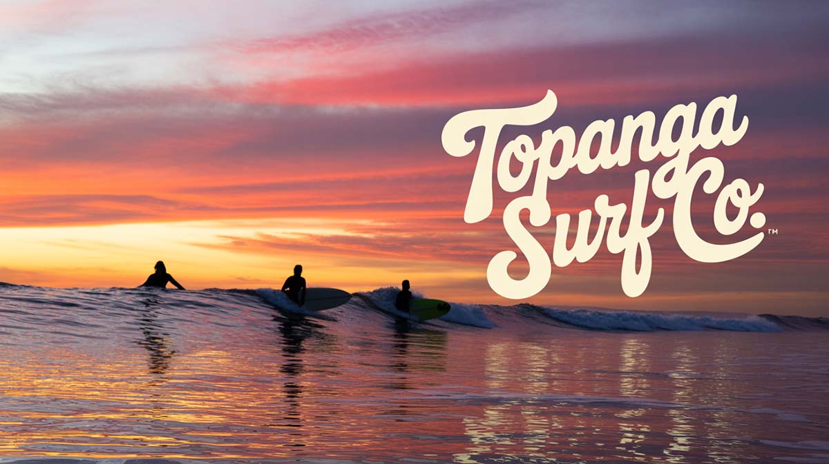 Topanga Surf Co. logo overlaid on photo of surfers at sunset in Southern California