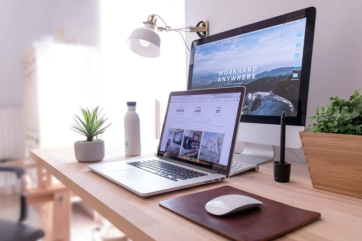 Local business websites on desktop and laptop screens, Pioneer Valley WordPress websites in use