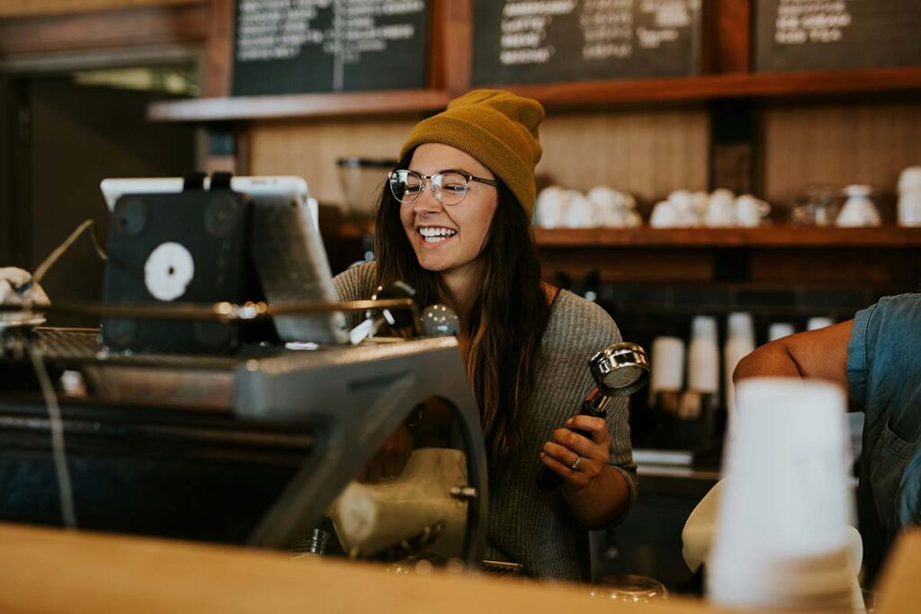 Barista in a Local Coffee Shop highlighting the need for a good local business web design
