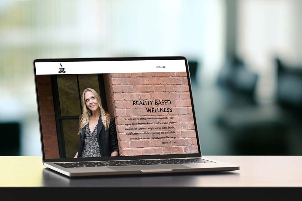 Mac book movkup showing website of Kelly Coffey, professional health coach